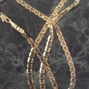 Semi solid gold mariner link chain.